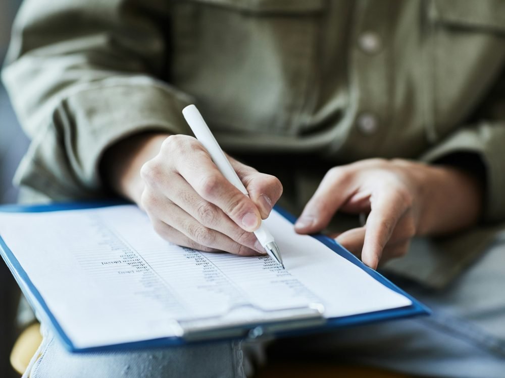 Writing on Clipboard Closeup